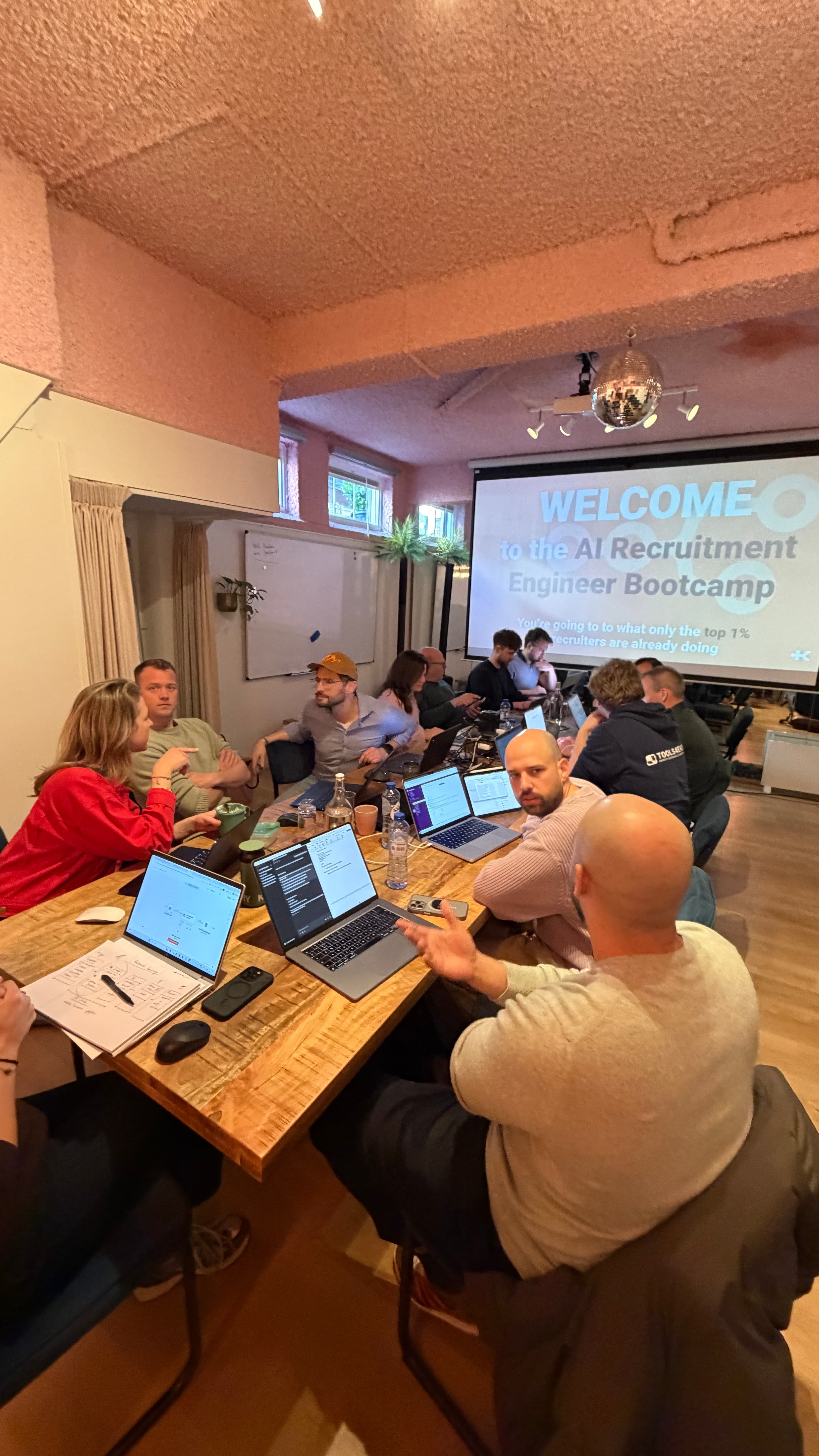Bootcamp participants working on their first AI recruitment automation